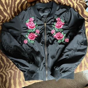 Bomber jacket with floral stitching